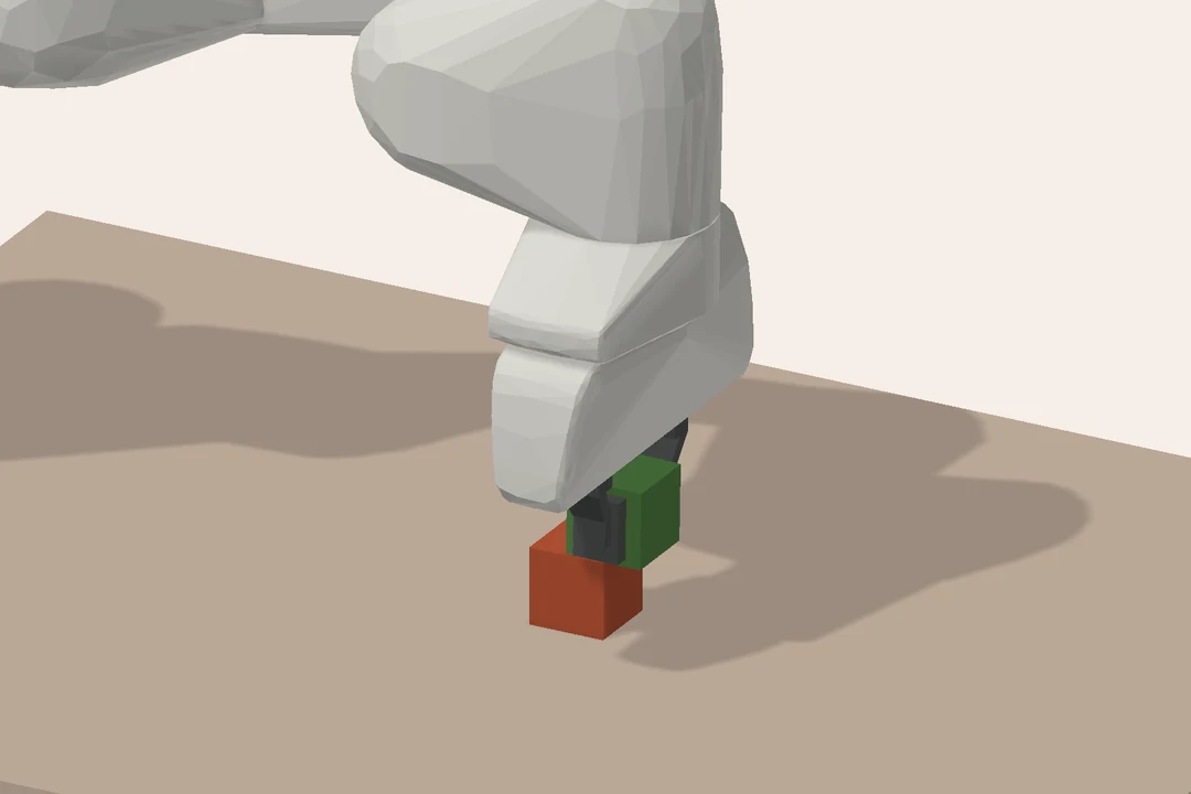 The Panda gripper placing a cube near the edge of its support.